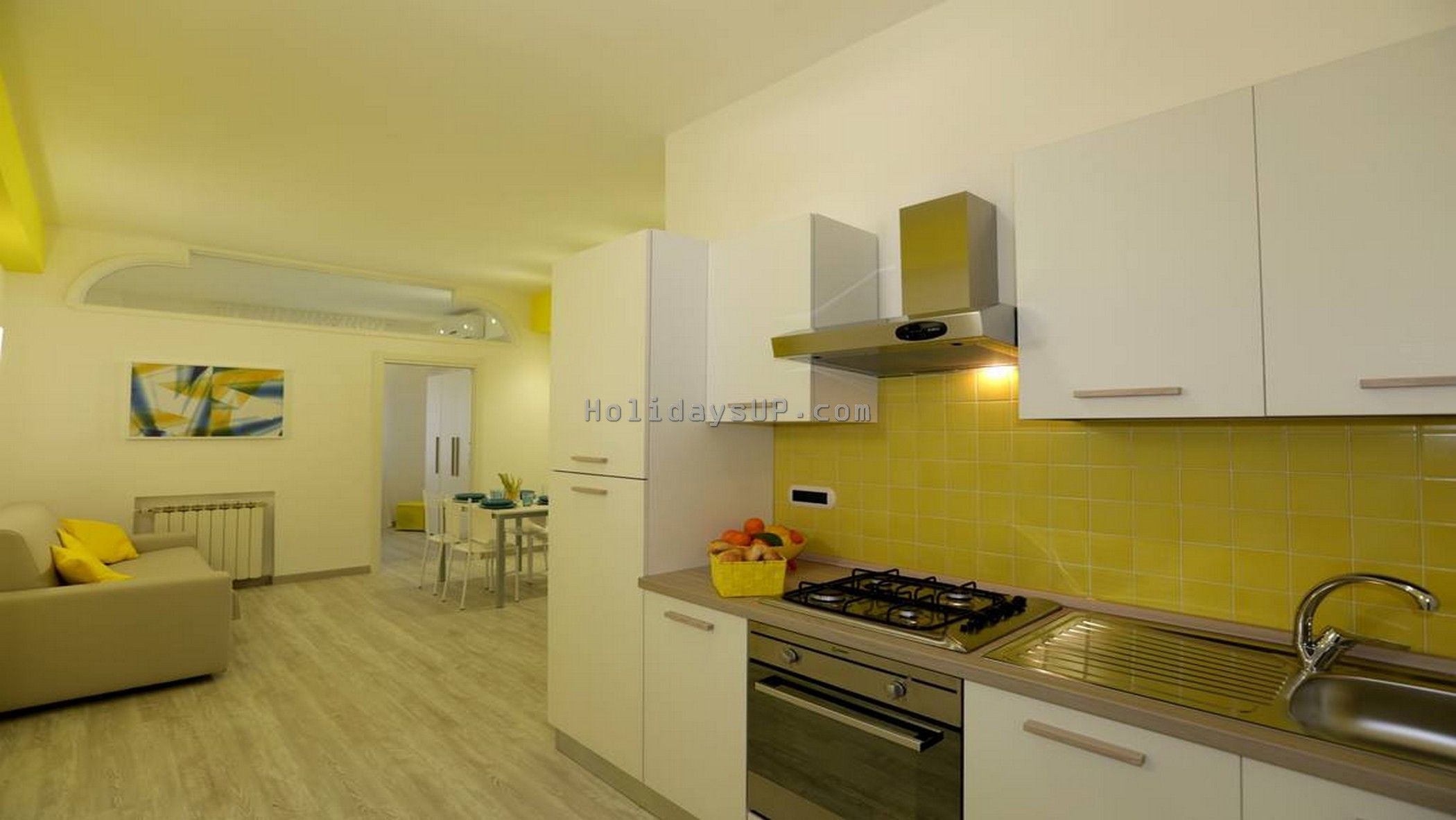 Living area and kitchen side apartment casa mariandre b booking rentals